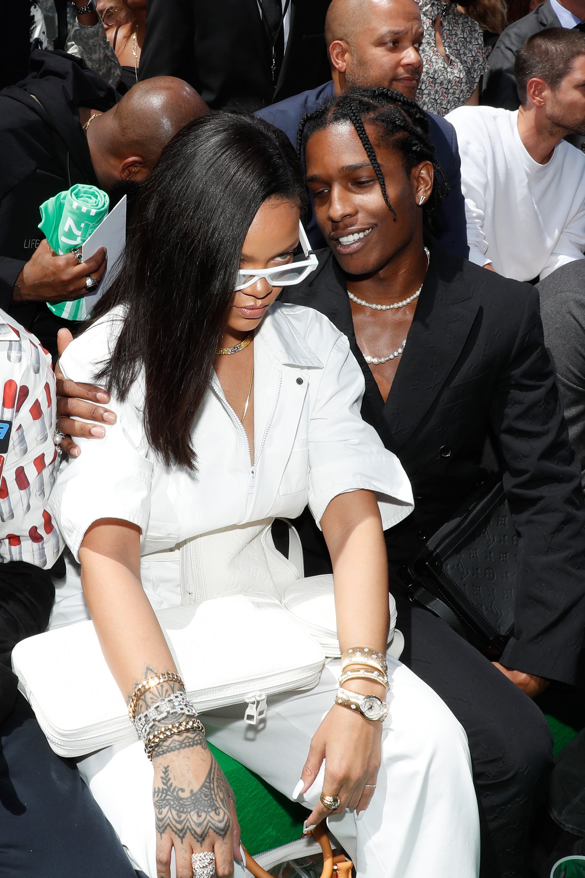 the floor is covered in champagne — Rihanna and A$ap Rocky attend the Louis  Vuitton