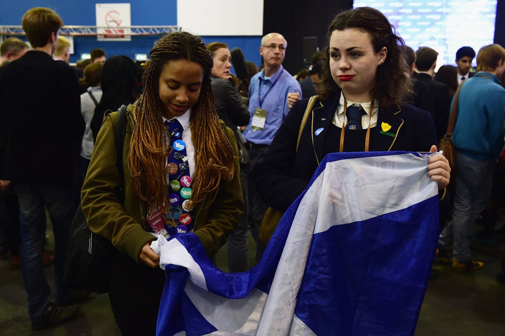 "Yes" supporters looked dejected as they held the Scottish flag.