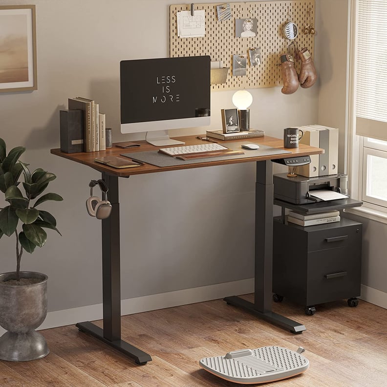A Standing Desk: Fezibo Electric Height Adjustable Standing Desk