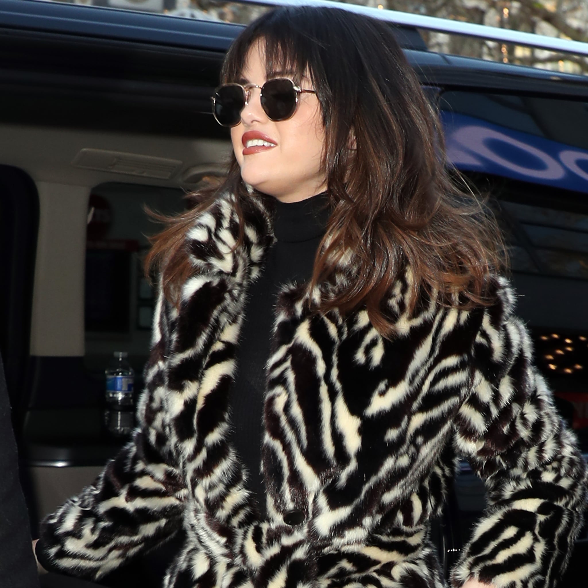 Selena Gomez's Mango Zebra Coat and Burberry Leopard Coat | POPSUGAR Fashion