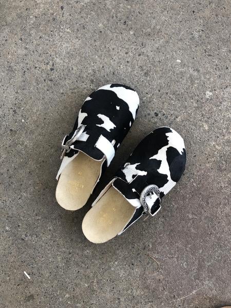 "Working from home is a great opportunity to lean into a cozy shoe. The Brother Vellies Greg Shoe in Cow ($395) is perfect to pair with a rolled jean and cozy sock."