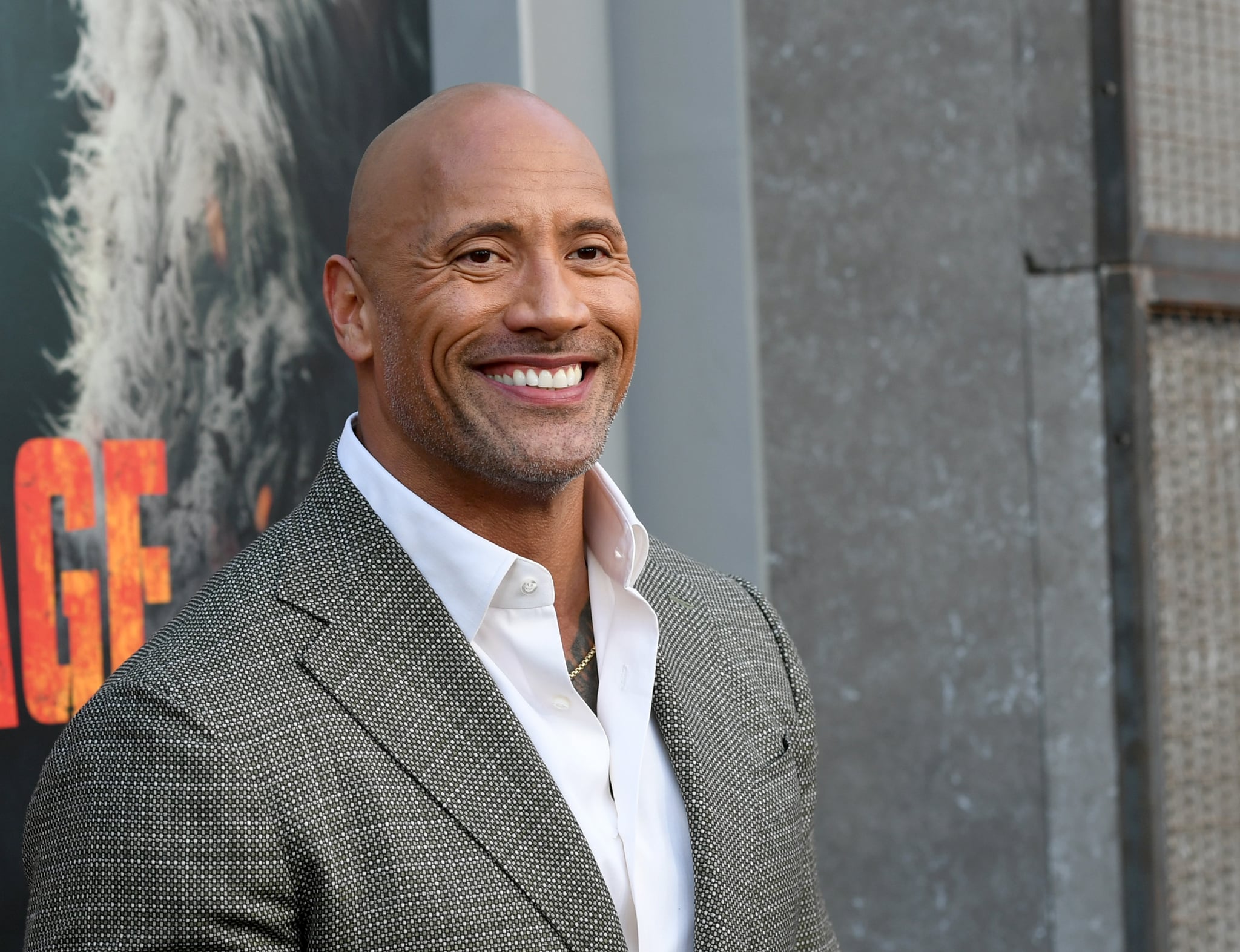 LOS ANGELES, CA - APRIL 04:  Actor Dwayne Johnson arrives at the premiere of Warner Bros. Pictures' 