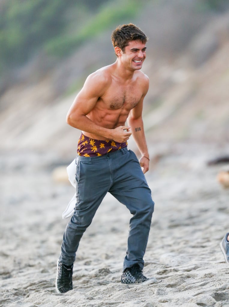 He was all smiles (and abs, and biceps) while filming We Are Your Friends on the beach in LA in September 2014.
