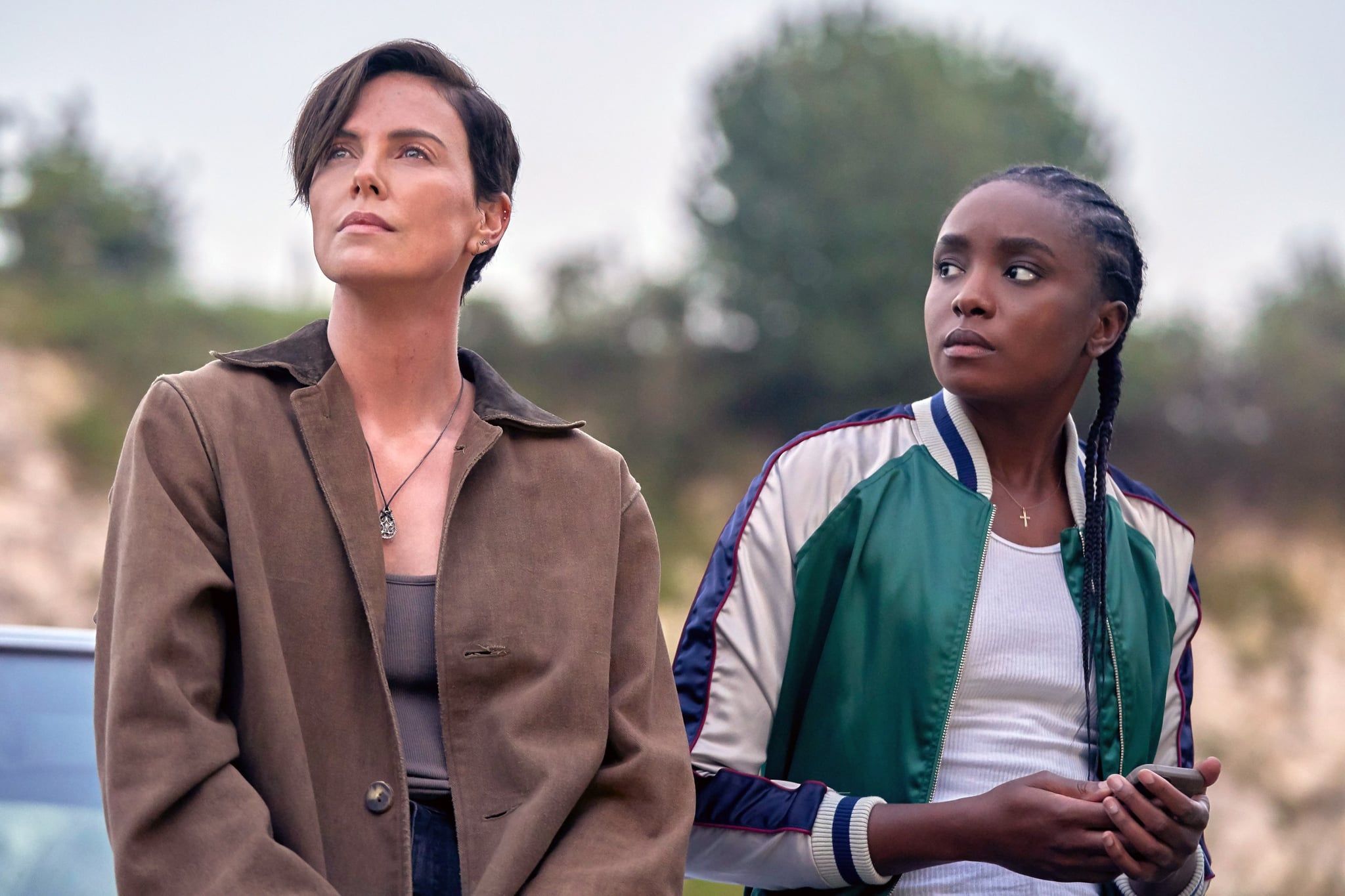 THE OLD GUARD, from left: Charlize Theron, Kiki Layne, 2020. ph: Aimee Spinks /  Netflix / Courtesy Everett Collection
