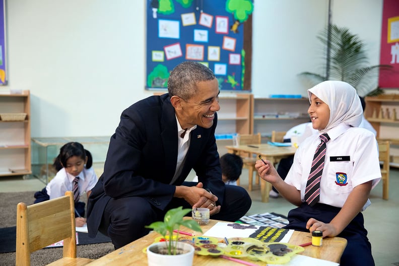 When he chatted with a young refugee in Kuala Lumpur, Malaysia, as she worked on a painting