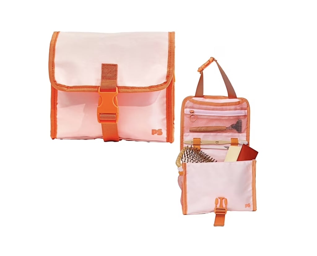 Popsugar Hanging Travel Toiletry Bag ($20)
If you're living in a dorm room, chances are your toiletries don't have a permanent home. This hanging organizer has multiple compartments for everything from a toothbrush to a razor, keeping all your essentials in one place. Plus, all you need to do is fold up the pouch for travel-safe storage on the go, making it ideal for weekend trips.