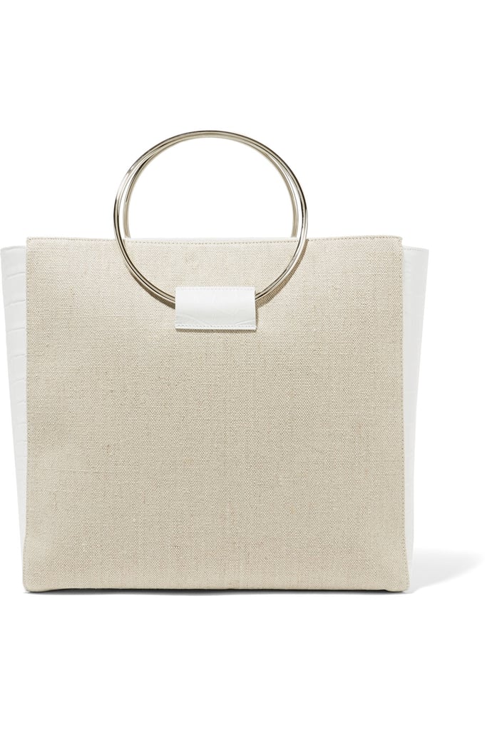 This Little Liffner ring canvas and croc-effect leather tote ($545) goes from the beach to the office in a snap.