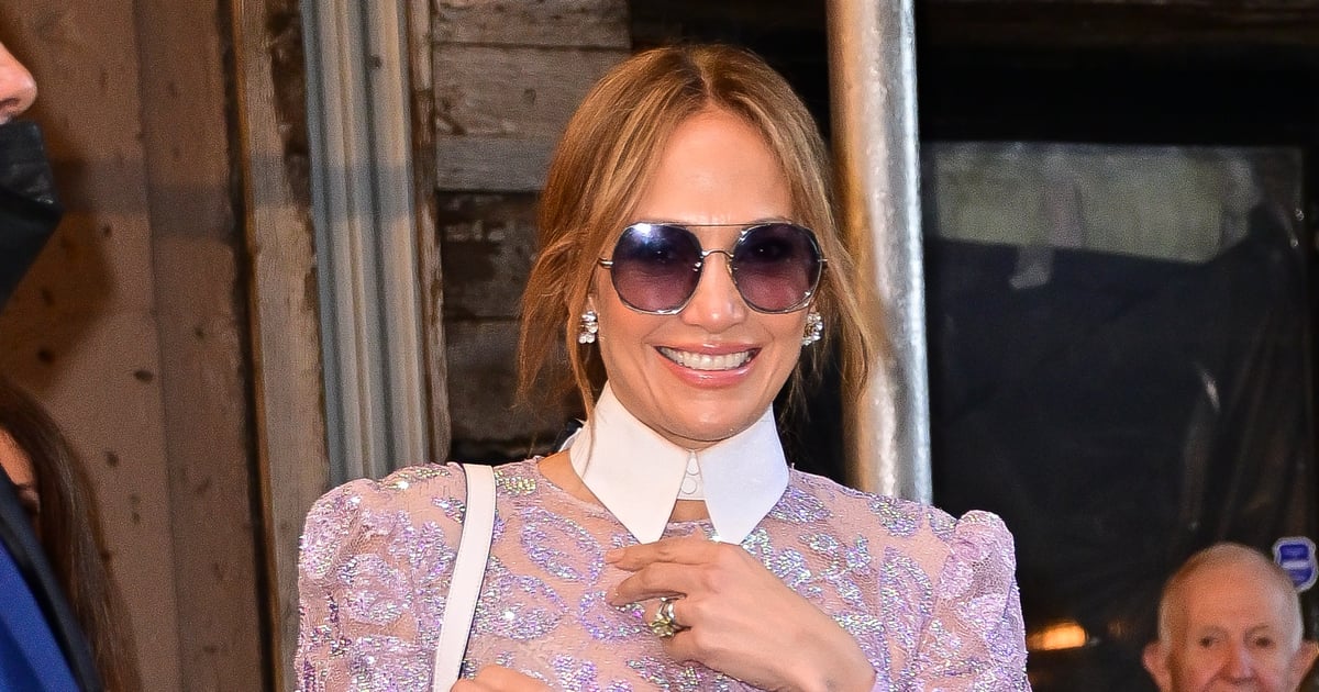 J Lo Embraces ’70s Style in Flared Dark Denim Jeans