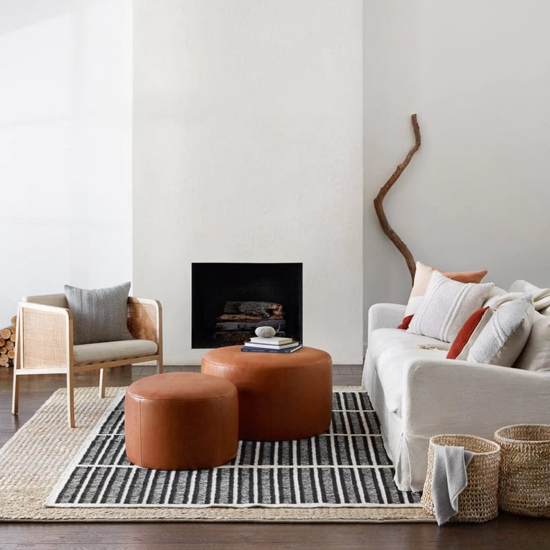 For the Living Room: A Curved Faux-Leather Ottoman