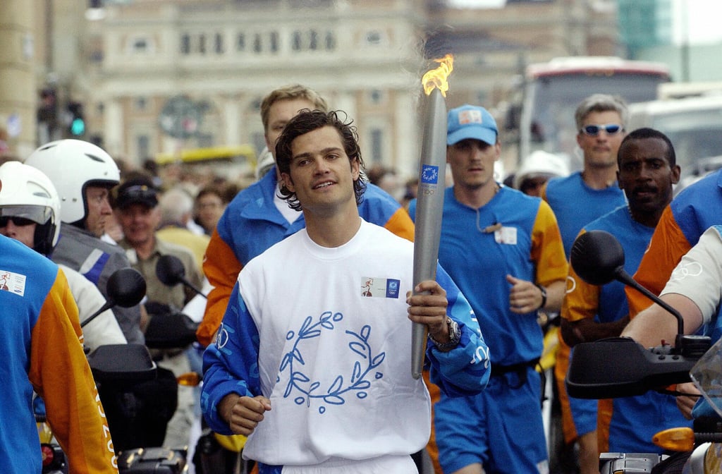 He showed off his sporty side for the Athens 2004 Olympic torch relay in Stockholm.