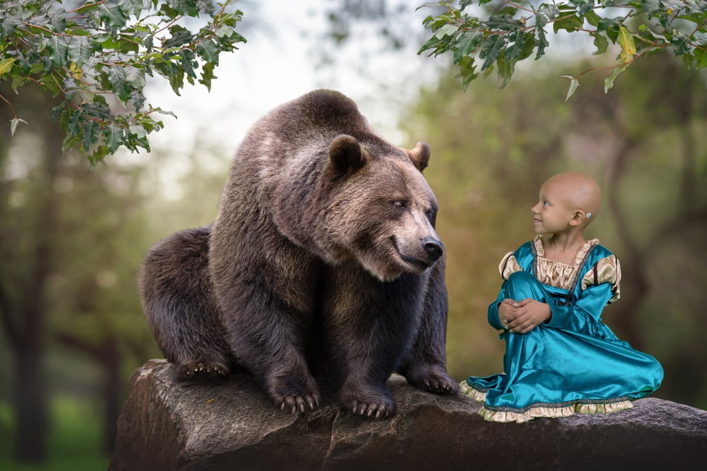 Arianna Dressed as Princess Merida With a Bear