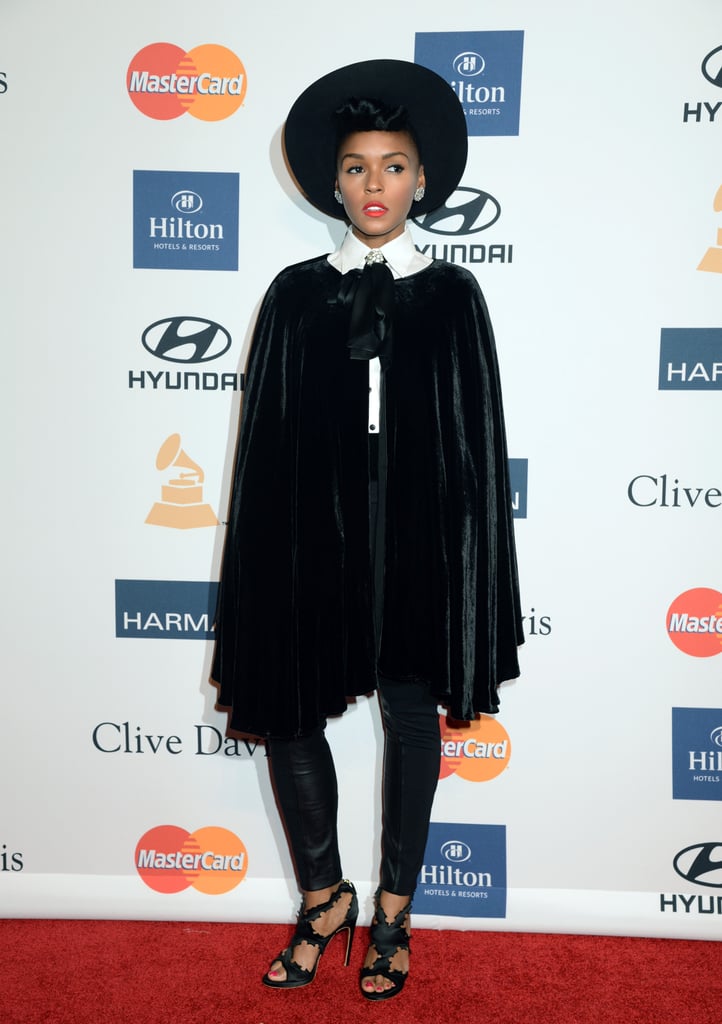 Janelle mixed things up by finishing off her signature style with a soft velvet cape.