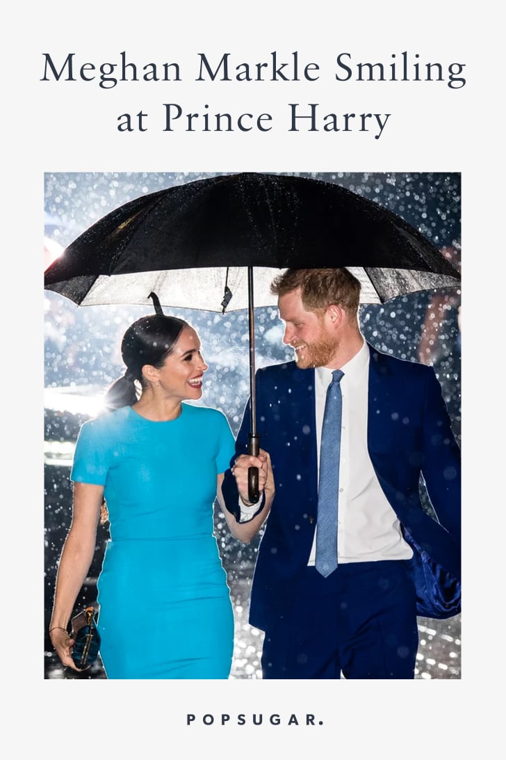 Meghan Markle Looking at Prince Harry Pictures