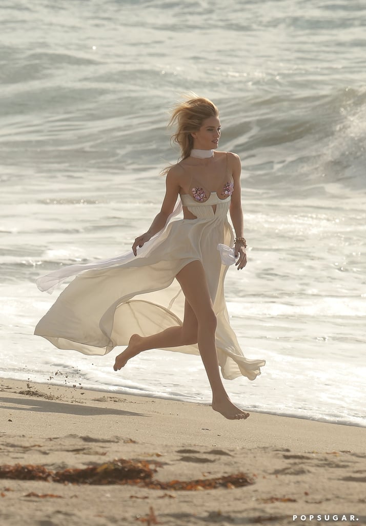 Rosie Huntington-Whiteley ran in the Malibu, CA, sand during a photo shoot on Saturday.