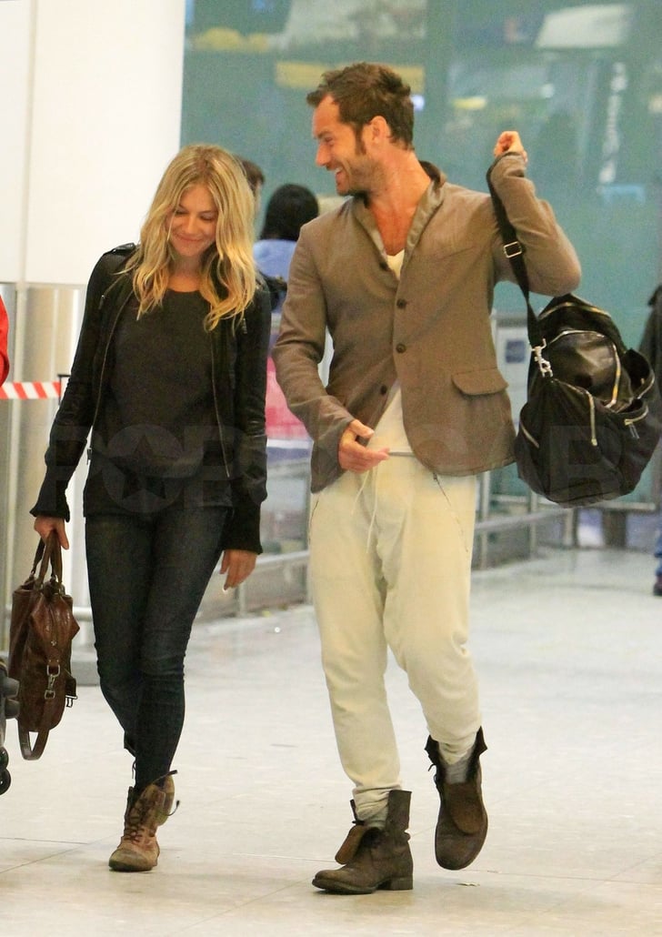 Pictures Of Sienna Miller And Jude Law Arriving Back In London Together Popsugar Celebrity