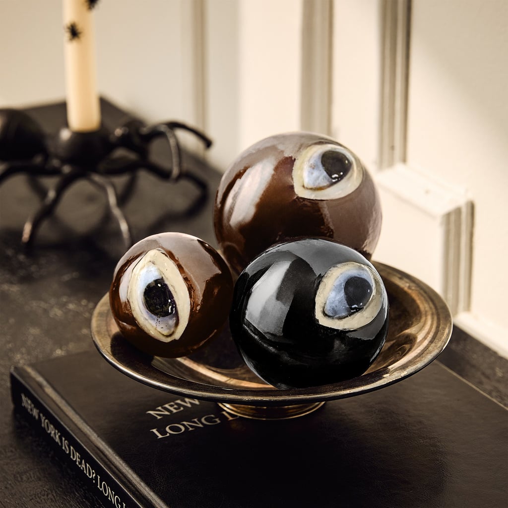 West Elm Halloween Frankenstein Eye Bowl Fill (Set of 3) ($55)
If you're looking for something a little more sophisticated for your home that still embodies the Halloween vibe, these glass Frankenstein eyes are a stunning, modern pick. Each eyeball is made from blown glass and comes in a set of three. Place them in a bowl of your choice on a coffee table, side table, mantel, or even on your dining table as hosting decor.