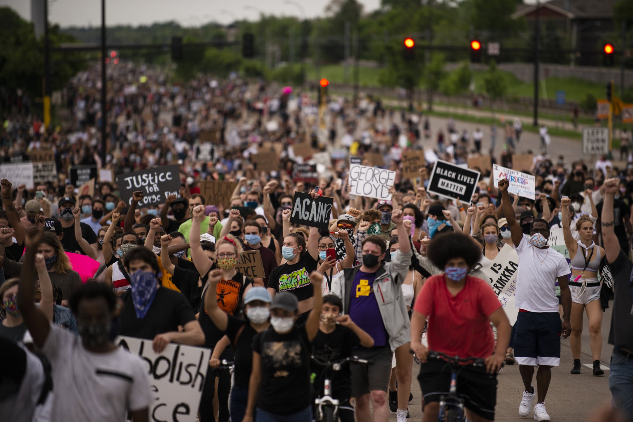 MINNEAPOLIS, MN - MAY 26: Protesters march on Hiawatha Avenue while decrying the killing of George Floyd on May 26, 2020 in Minneapolis, Minnesota. Four Minneapolis police officers have been fired after a video taken by a bystander was posted on social media showing Floyd's neck being pinned to the ground by an officer as he repeatedly said, 