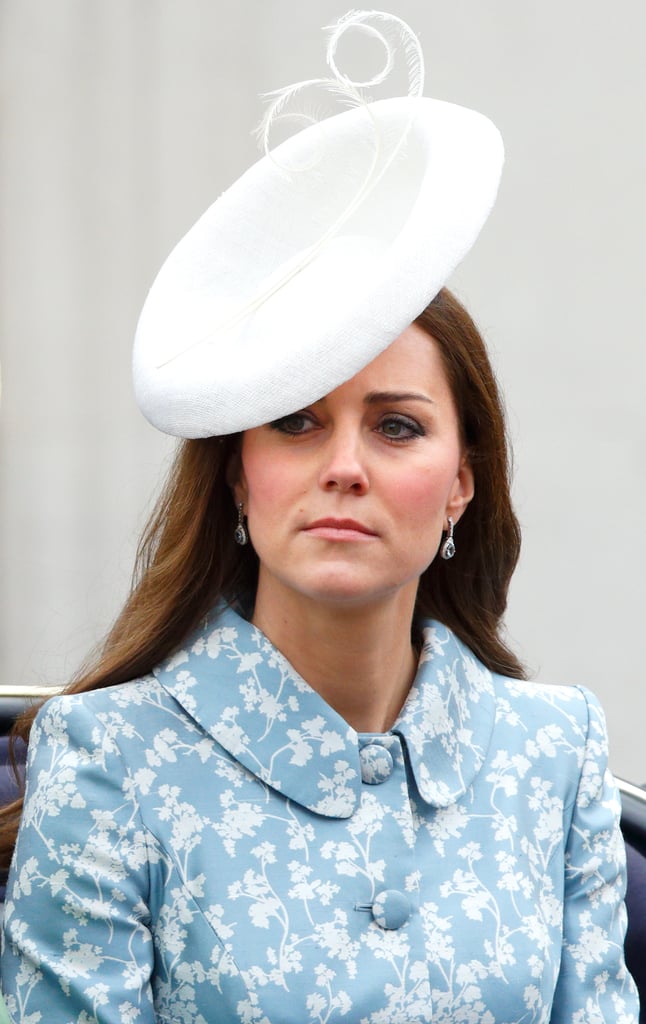 Kate's white hat by Sylvia Fletcher for Lock & Co offered a striking contrast to her floral Catherine Walker coat dress.