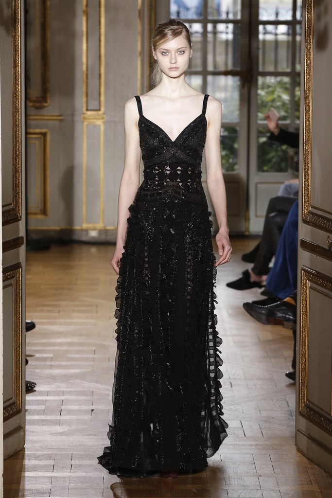We're daring Chrissy to go dark with some added shimmer in this sexy gown from the Fall runway.