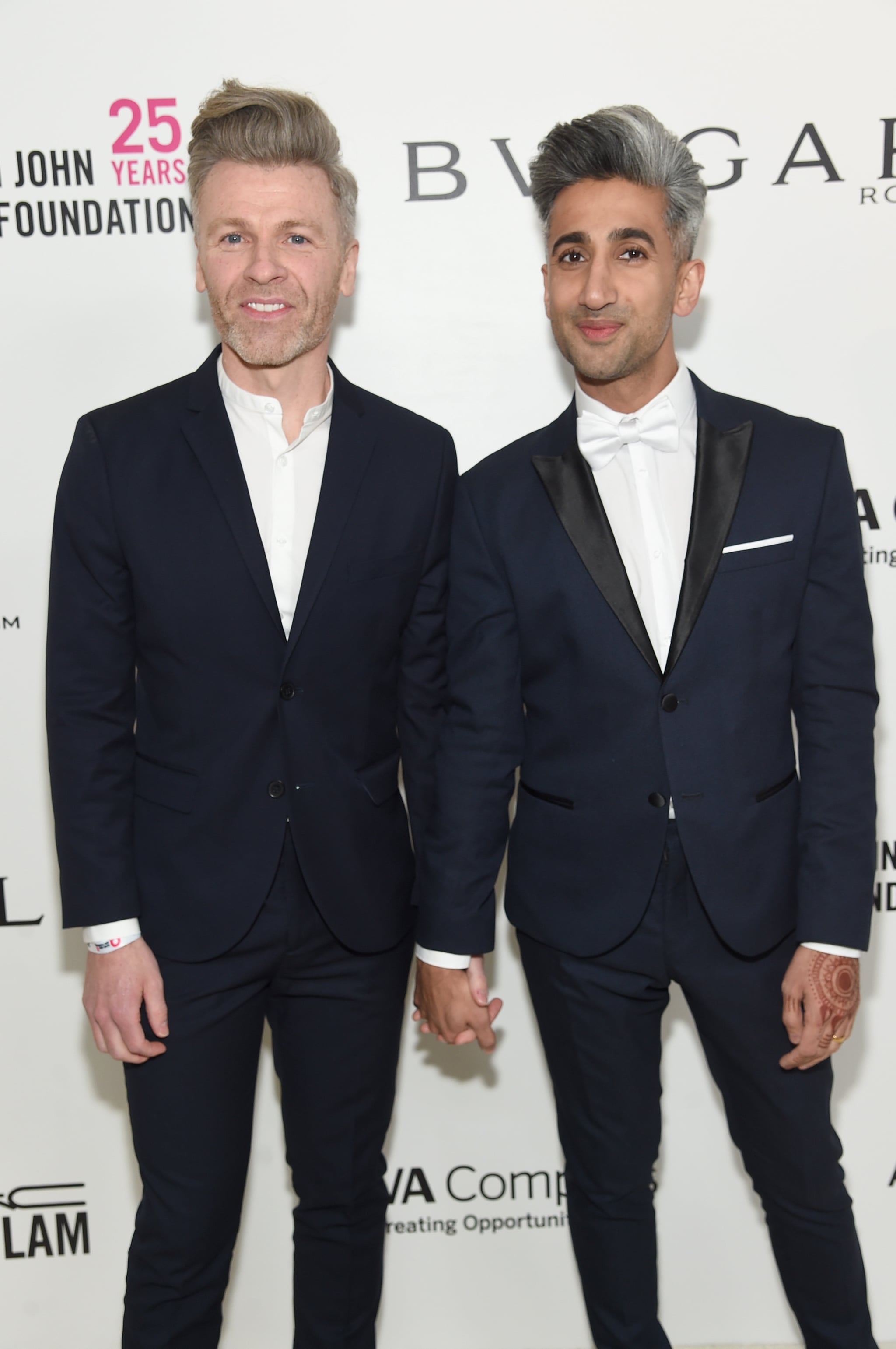 WEST HOLLYWOOD, CA - MARCH 04:  Rob France (L) and Tan France attends the 26th annual Elton John AIDS Foundation Academy Awards Viewing Party sponsored by Bulgari, celebrating EJAF and the 90th Academy Awards at The City of West Hollywood Park on March 4, 2018 in West Hollywood, California.  (Photo by Jamie McCarthy/Getty Images for EJAF)