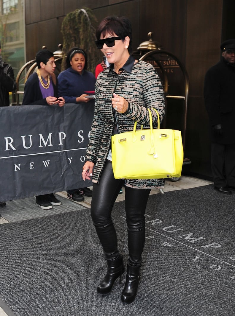 Kris Brightened Up Her Leather Pants With a Yellow Bag