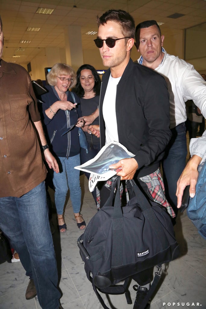 Robert Pattinson Arrives at the Cannes Film Festival 2014