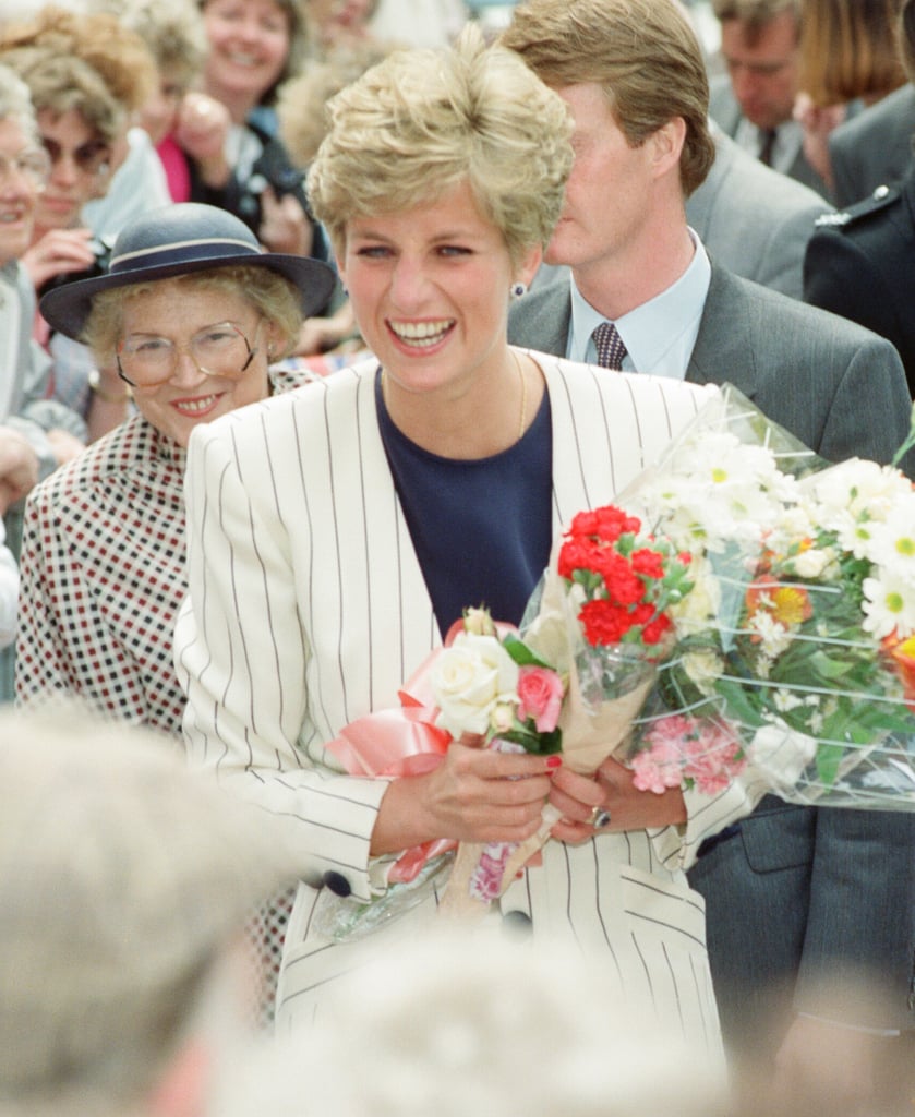 While pinstripe is reminiscent of a baseball player's uniform, Diana, too, proved its fashion-forward appeal in a printed blazer over a navy top while greeting royal fans in Sheffield in 1991.