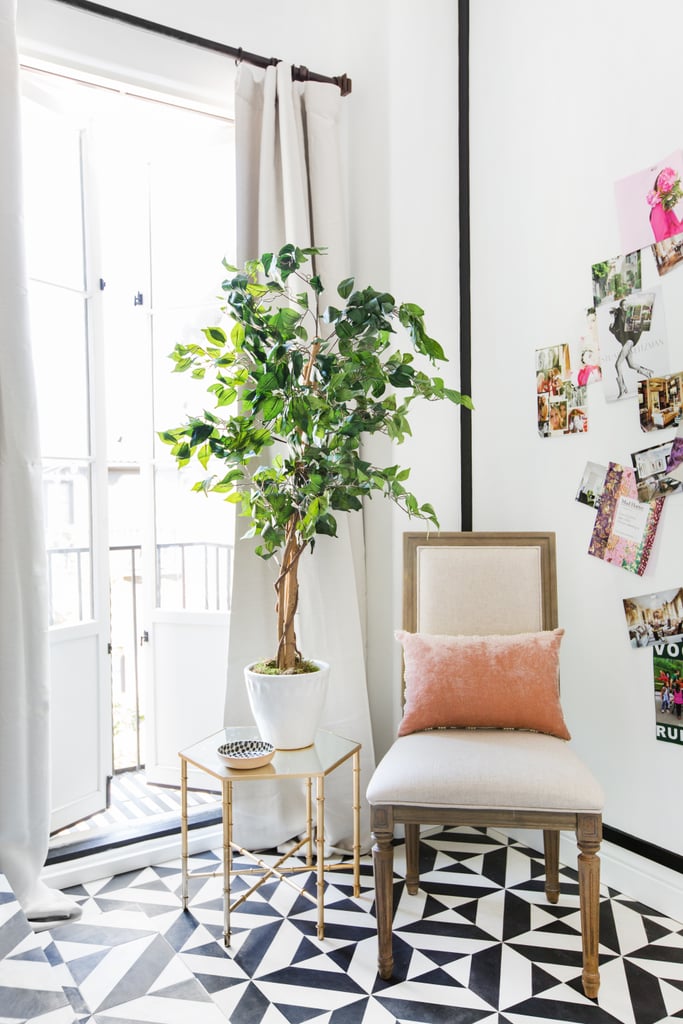 The high-contrast black and white palette seen throughout Shay's guesthouse was no accident. Mat explains, "This allowed us to create rich layers with cozy, natural textures and tones. We used a bold graphic tile throughout the space to create a look that is dramatic yet inviting." He added a money tree because "everyone needs something living in their space."