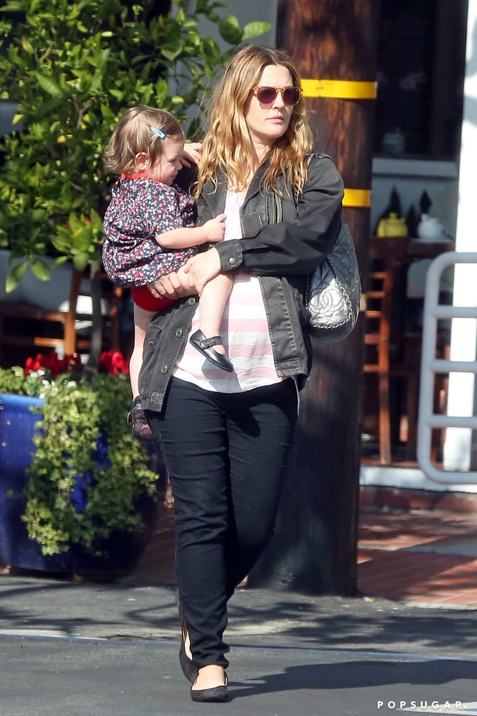 Drew Barrymore bonded with her daughter, Olive, as the pregnant actress left Fred Segal in LA on Saturday.