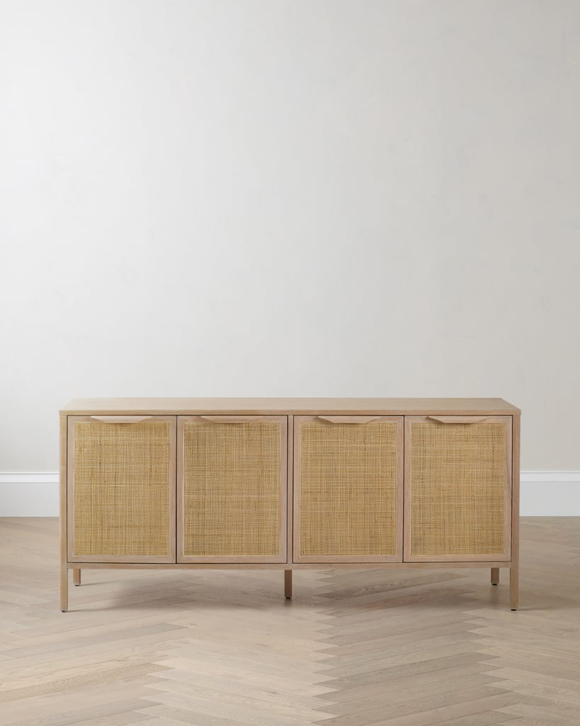 Quince Solid Wood and Natural Rattan Sideboard ($1,200)
I've had a variation of this storage cabinet in all my apartments, but this wood and rattan design is at the top of my wish list. The short and narrow features make it friendly to tight spaces, while being the perfect place to store trinkets, linens, party supplies, or TV accessories. Plus, you have full creative freedom to style the long, flat surface with art and coffee table books.