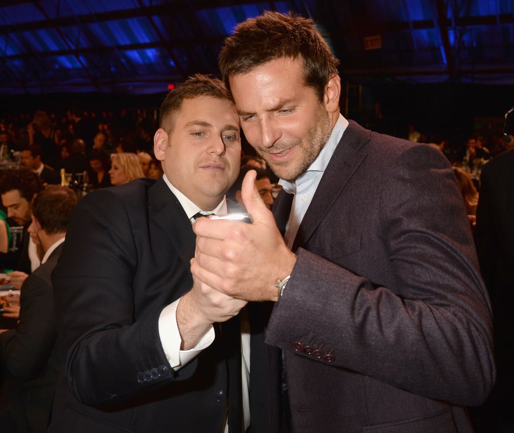 Jonah Hill and had some boisterous fun while looking pics on a phone