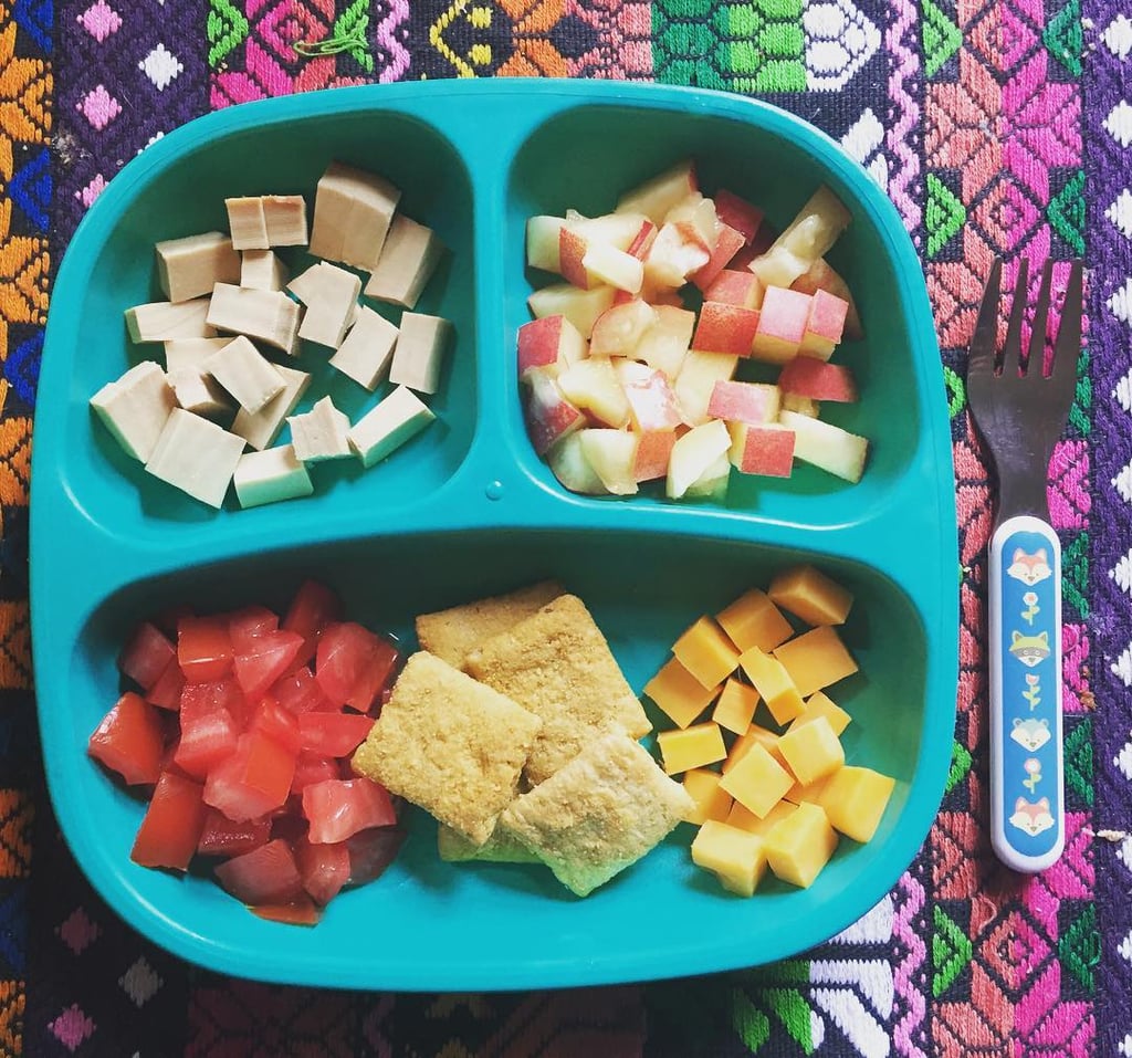 "Lunch: tofu, nectarines, tomato, quinoa crackers, and cheddar cheese."