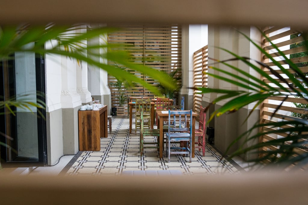 This secluded patio is a popular spot to catch up with friends and family over a cup of coffee or espresso.