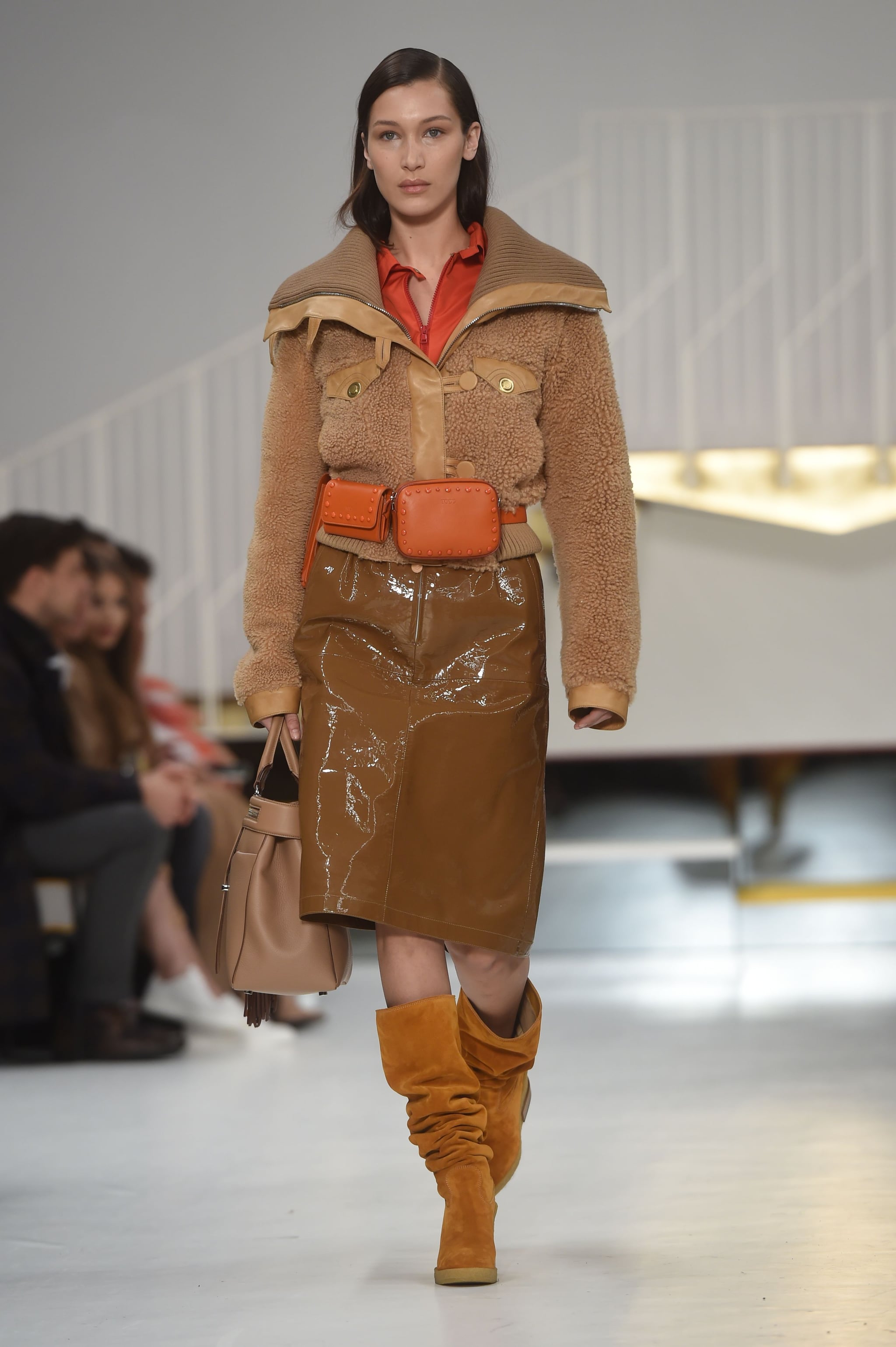 Walking in Tod's wearing a teddy coat 