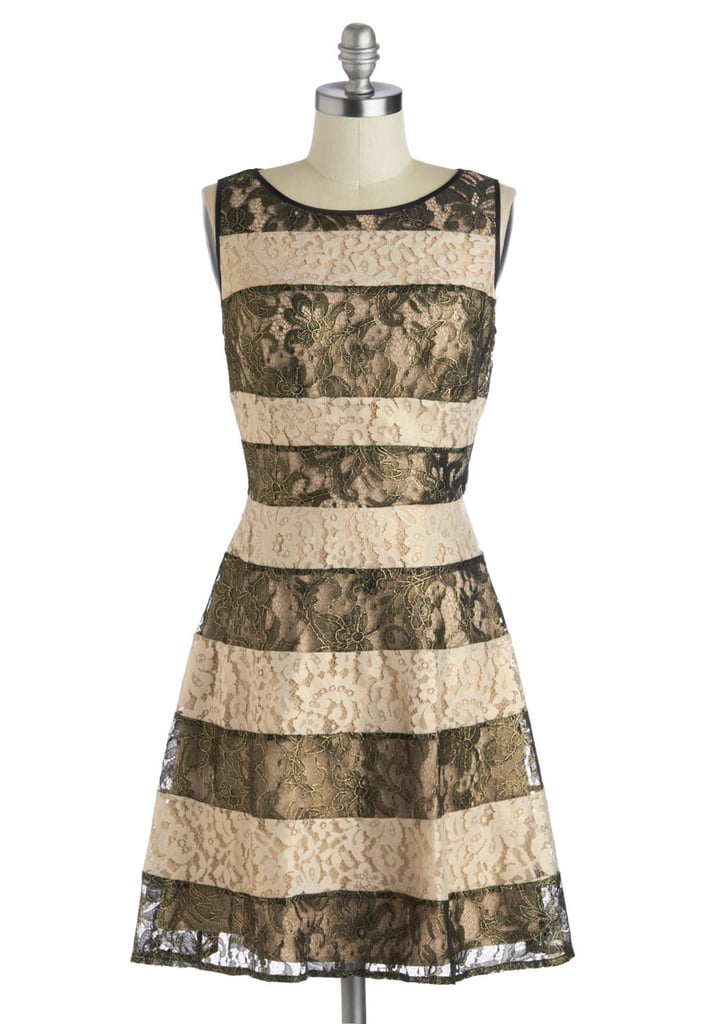 Less harsh than stark black and white, the bronze and champagne colors of this ModCloth find ($118, originally $168) make an elegant option for your next evening event.