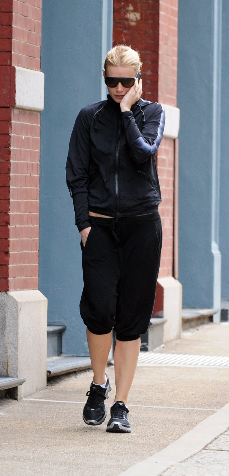 Gwyneth Paltrow Wearing a Black Sports Jacket and Shorts