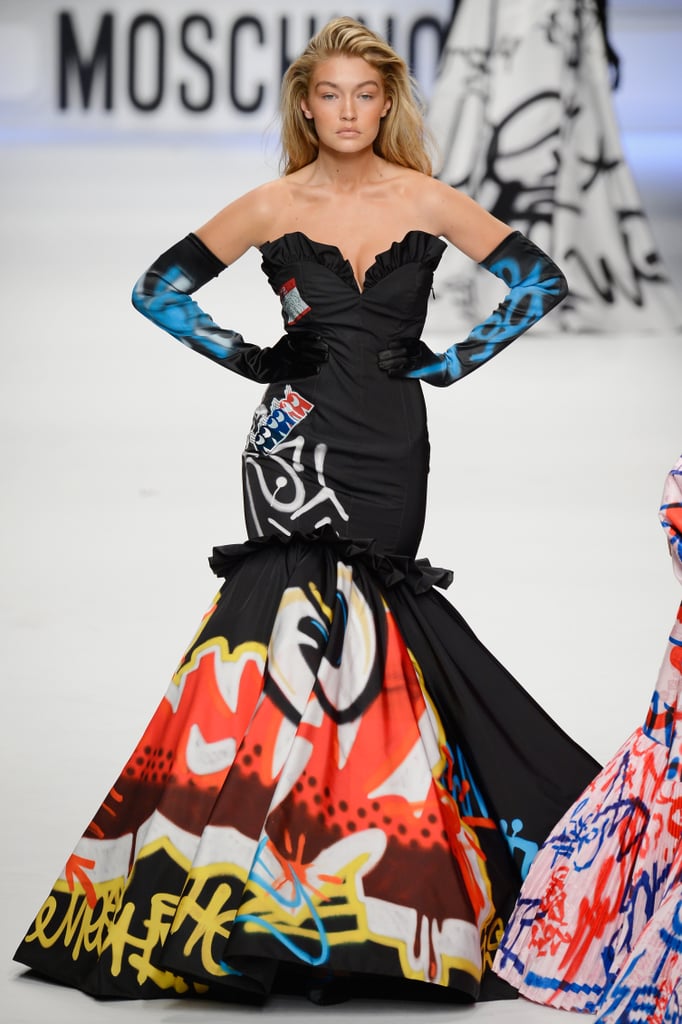 And she looked totally sexy in a graffiti-covered gown and matching gloves at Moschino.