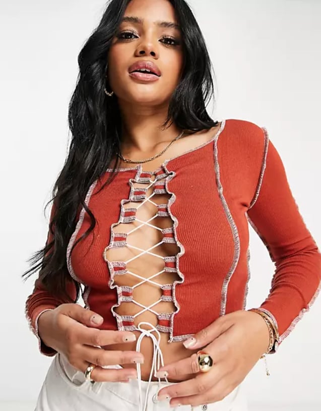 Rebellious Tie Front Contrast Seam Crop Top in Rust