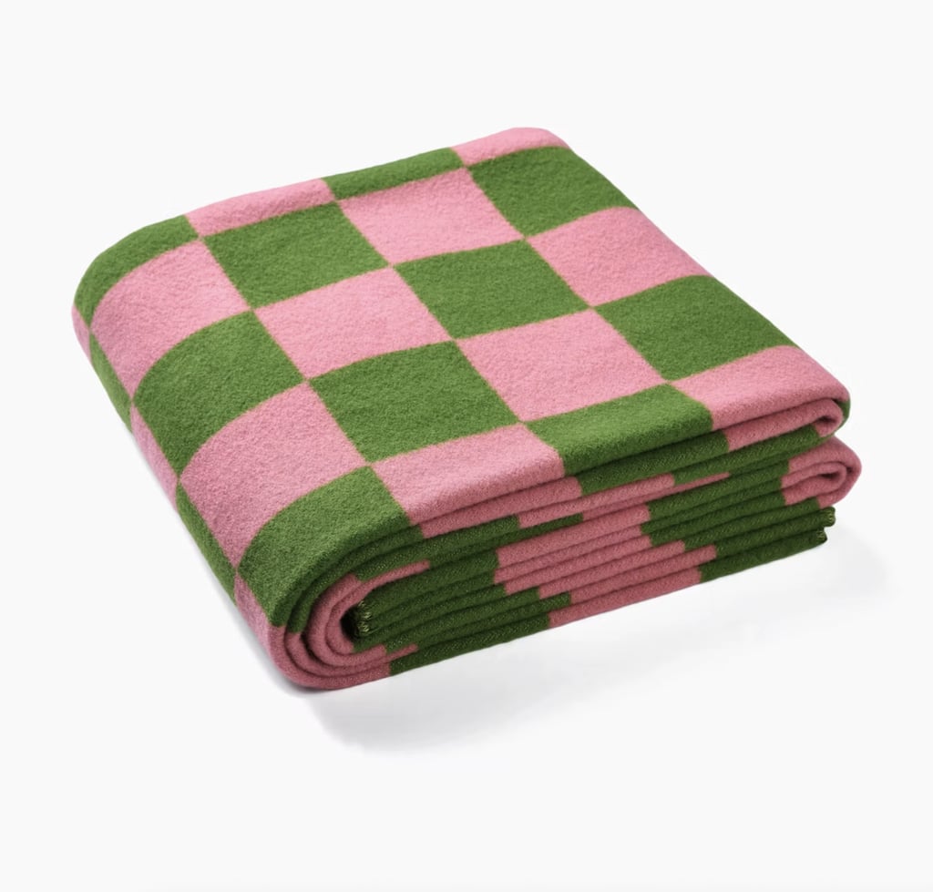 Herman Miller Girard Throw ($244, originally $325)
Everyone needs an office blanket, not only to warm up from the unpredictably cold office air conditioning, but also to add a touch of cozy to your space. Pink and green will forever be a favorite color combo of mine, and this throw encapsulates just that.