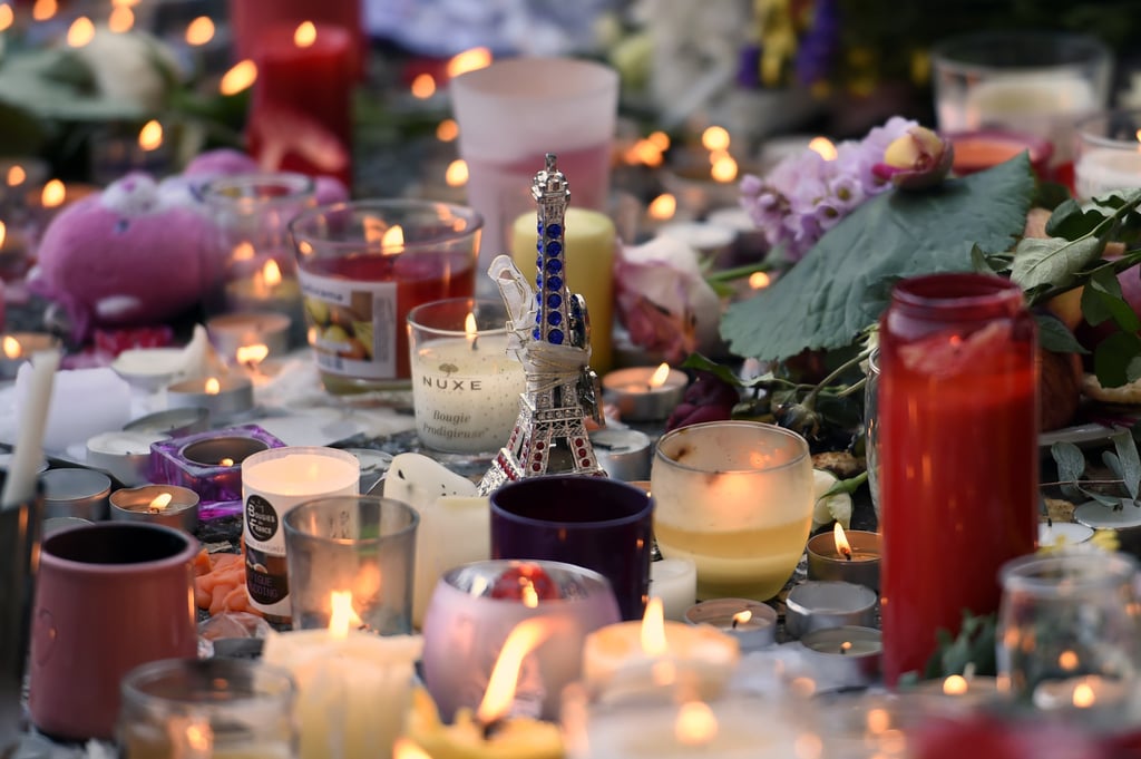 A small Eiffel Tower was placed among candles at a memorial near France's Bataclan Center.