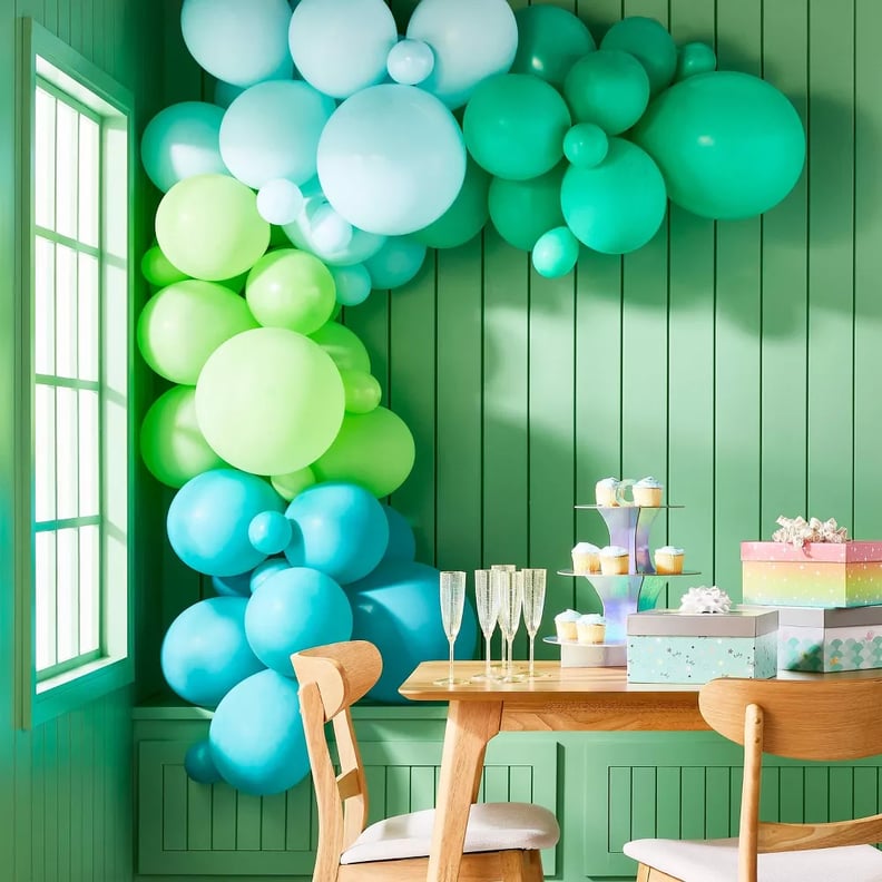 A Green and Blue Balloon Arch