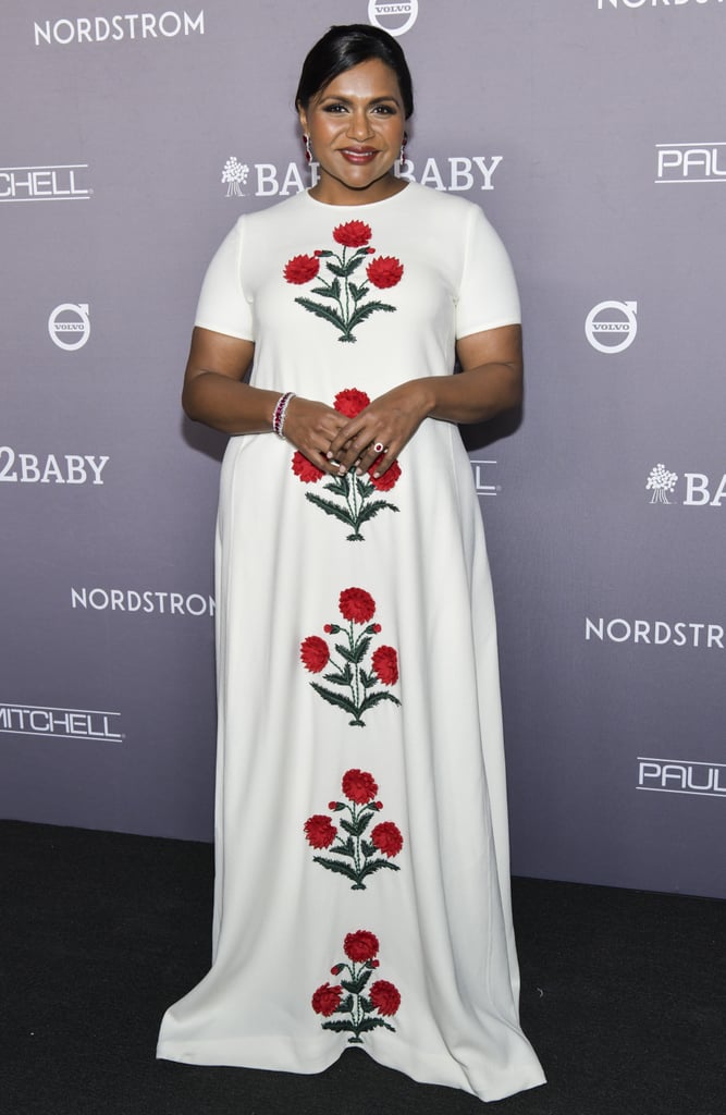 Kaling wore a free-flowing Oscar de la Renta dress with red poppy embroidery to the 2019 Baby2Baby Gala, tying her hair back to reveal diamond and ruby jewels.