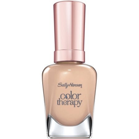 "I think this product is great for any season but there are tons of rich, deep jewel tones perfect for the winter season. The colors are broken down into nudes, pinks and rich tones so you'll be able to find a color for whoever you're shopping for. What's unique about this nail color and top coat is that it's blended with oils that are moisturizing for your nail plate so you can be sure to care for your nail without sacrificing gorgeous color. I would recommend Unwined for someone who likes to wear red, Chai On Life  or Steely Serene for someone who likes neutrals, and Soothing Sapphire or Bamboost for someone who is open to trying interesting colors."   
Sally Hansen Color Therapy Nail Color  ($7)