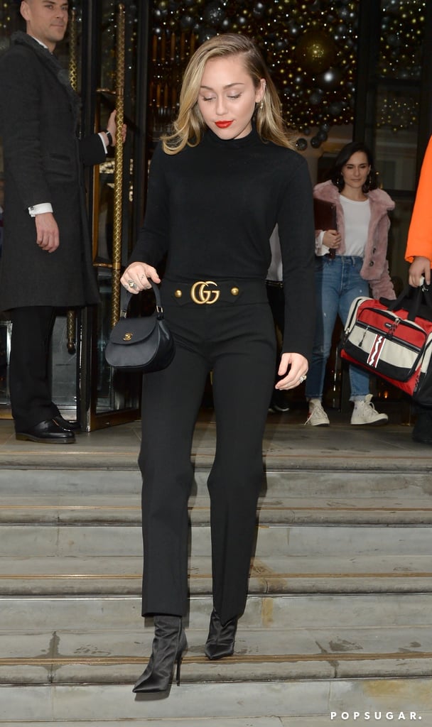 Miley Cyrus Wearing All Black With Gucci Pants in London