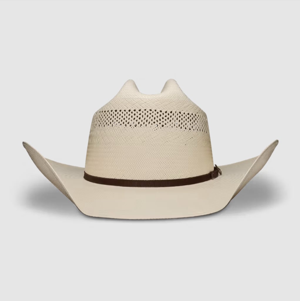 Tecovas Cattleman Straw Cowboy Hat ($145)
Not only will this hat's four-inch brim protect the face and neck from the sun, but the ventilated crown will allow for maximum air flow. Plus, the neutral straw material acts as the perfect summer color.
