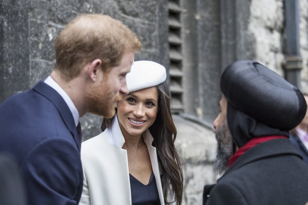 Meghan Markle Looking at Prince Harry Pictures