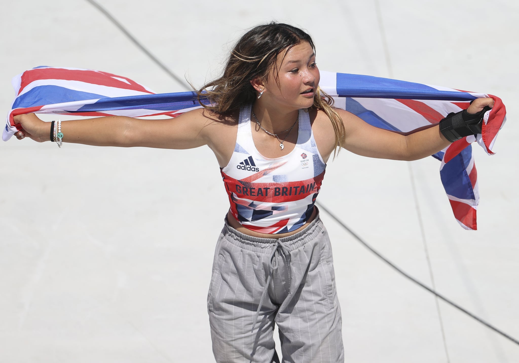 TOKYO, JAPAN - AUGUST 4: Sky Brown of Great Britain clebrates her Bronze Medal after the Women's Park Skateboarding Final on day twelve of the Tokyo 2020 Olympic Games at Ariake Urban Sports Park on August 4, 2021 in Tokyo, Japan.  (Photo by Jean Catuffe/Getty Images)