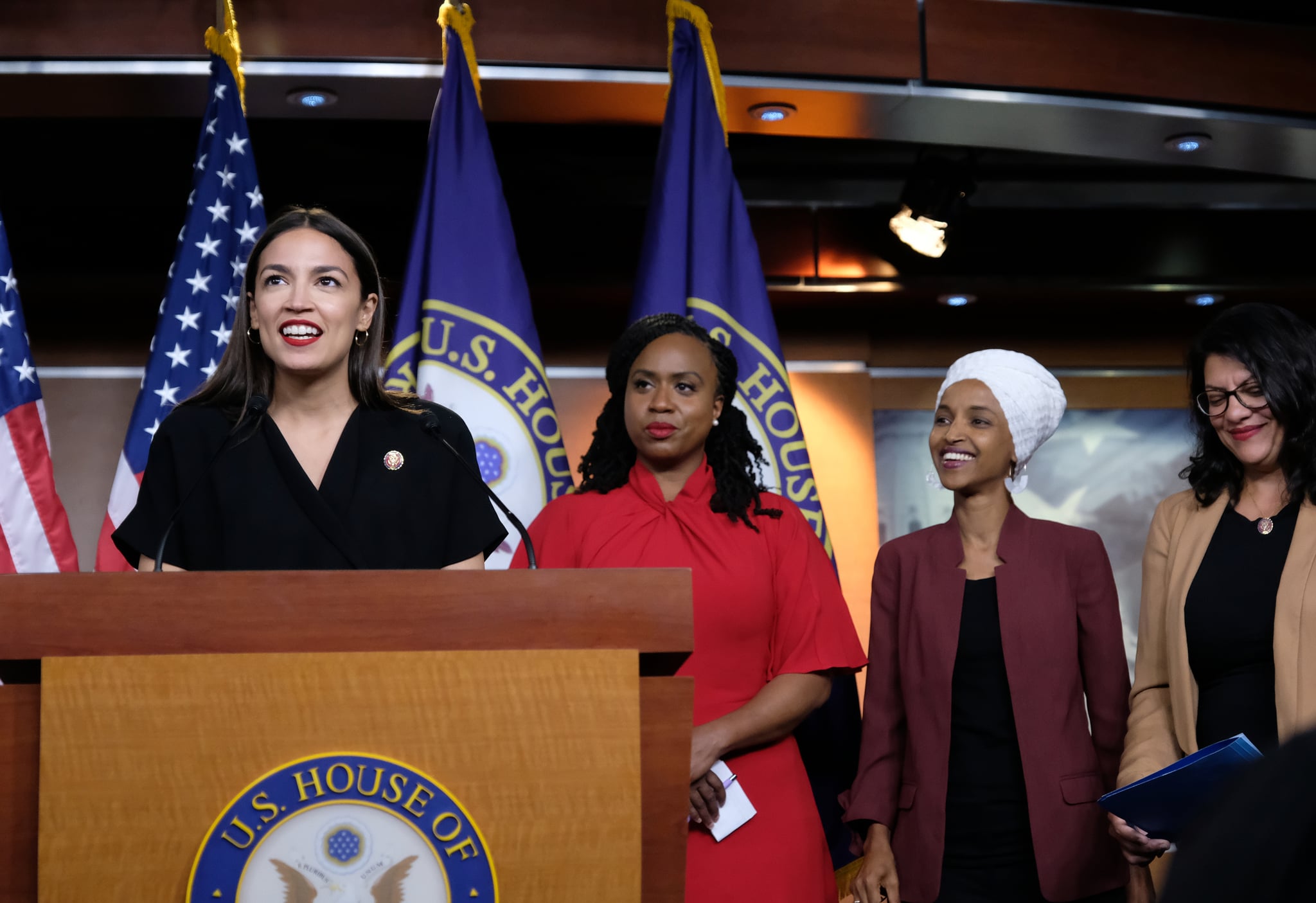 WASHINGTON, DC - JULY 15: U.S. Rep. Alexandria Ocasio-Cortez (D-NY) speaks as Reps. Ayanna Pressley (D-MA), Ilhan Omar (D-MN), and Rashida Tlaib (D-MI) listen during a press conference at the U.S. Capitol on July 15, 2019 in Washington, DC. President Donald Trump stepped up his attacks on four progressive Democratic congresswomen, saying if they're not happy in the United States 