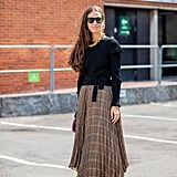 Fall Outfit Idea: Black Sweater + Plaid Skirt + Heels