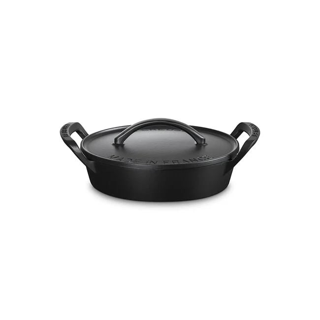 Le Creuset Alpine Outdoor Collection Utility Pan ($285)
If your dad turns into a top chef during grilling season, this will be his new favorite cast iron accessory. As the latest edition to Le Creuset's outdoor collection, this versatile design can seamlessly take you from camping to a backyard barbecue.